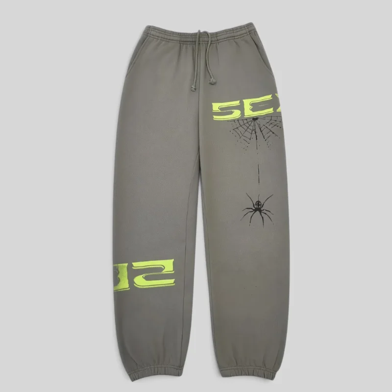 Front view of the Sp5der 5Ex sweatpants in Slate Grey, featuring premium cotton fleece and signature spider web graphics.
