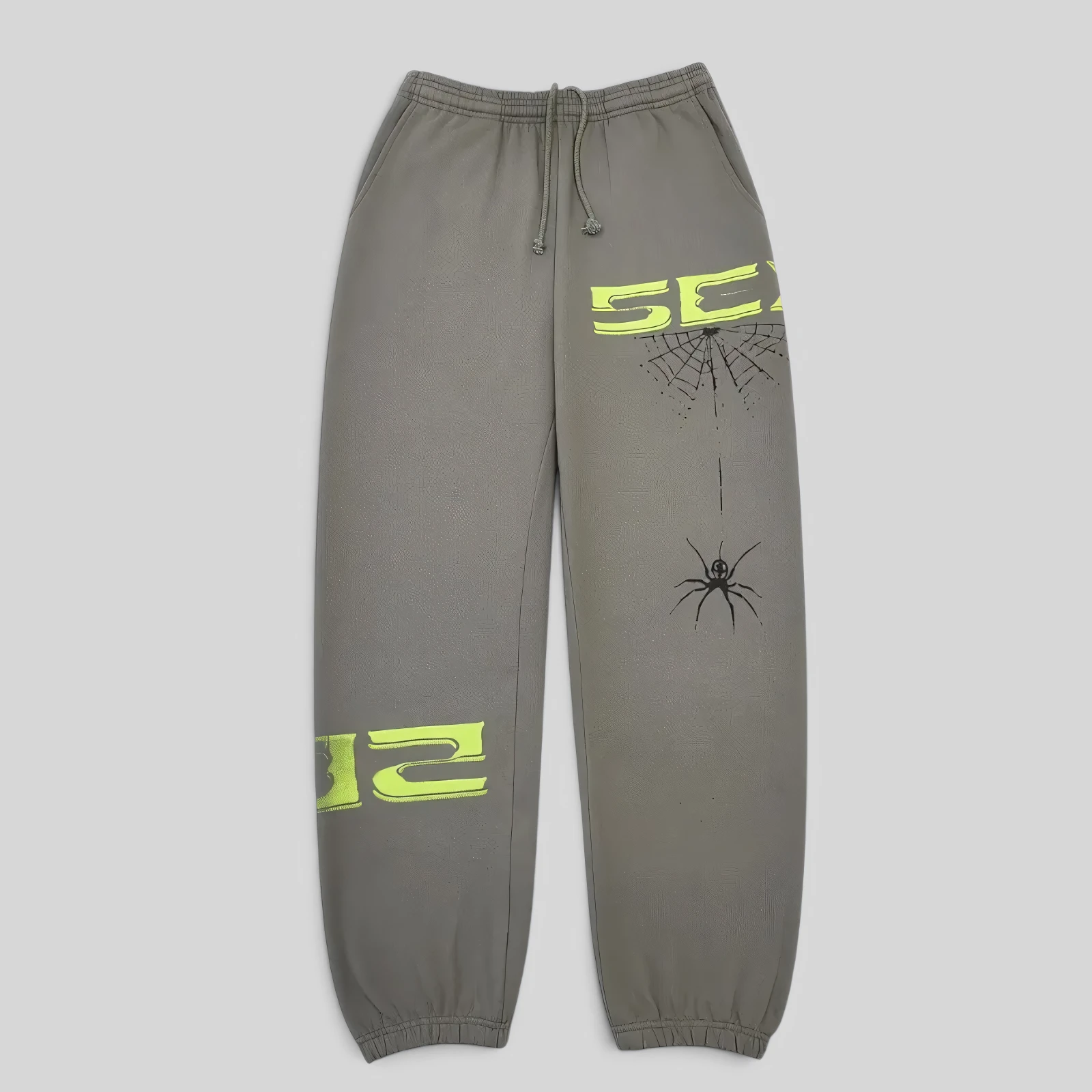 Front view of the Sp5der 5Ex sweatpants in Slate Grey, featuring premium cotton fleece and signature spider web graphics.