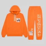 The Orange Sp5der 5Star Rodeo Tracksuit featuring a heavyweight cotton hoodie and matching sweatpants with graphics.