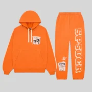 The Orange Sp5der 5Star Rodeo Tracksuit featuring a heavyweight cotton hoodie and matching sweatpants with graphics.