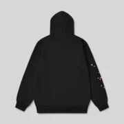 Back view of the black Sp5der Angel Number Hoodie showing 13oz cotton fleece fabric and star print on the arm sleeve.