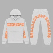 Sp5der Arach Tracksuit in Heather Grey featuring signature orange graphic print on a comfortable cotton fleece set.