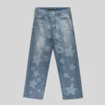 Sp5der Beluga Denim jeans in light blue wash featuring a faded vintage aesthetic and signature graphic print