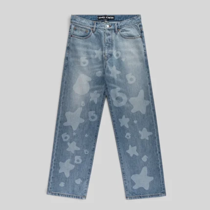 Sp5der Beluga Denim jeans in light blue wash featuring a faded vintage aesthetic and signature graphic print