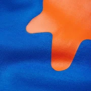 Close up of the Sp5der Beluga Tee blue fabric showing the bold orange plastisol graphic print on the front.