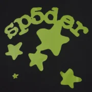 Close-up view of the Sp5der Beluga Tee black fabric featuring a vibrant green plastisol graphic print of stars.