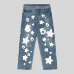Sp5der Beluga Wash Denim in Light Indigo with signature white star and number graphic prints, front view display.