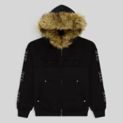 Sp5der Garibaldi Zip Up in Black featuring a faux fur hood and intricate sleeve accents with pink stone appliqué