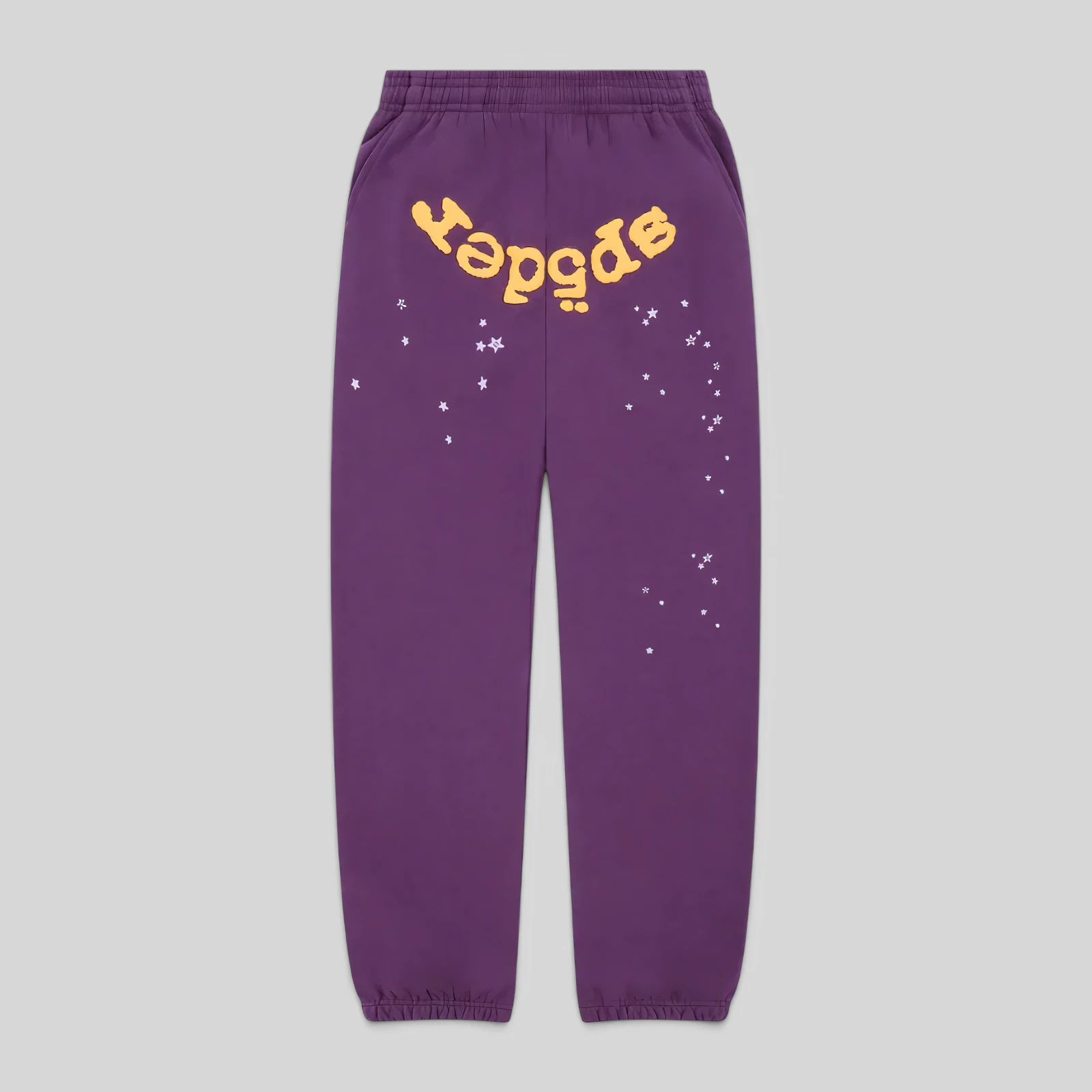 Front view of the purple Sp5der OG Web V2 sweatpants featuring signature yellow branding and star graphic details.
