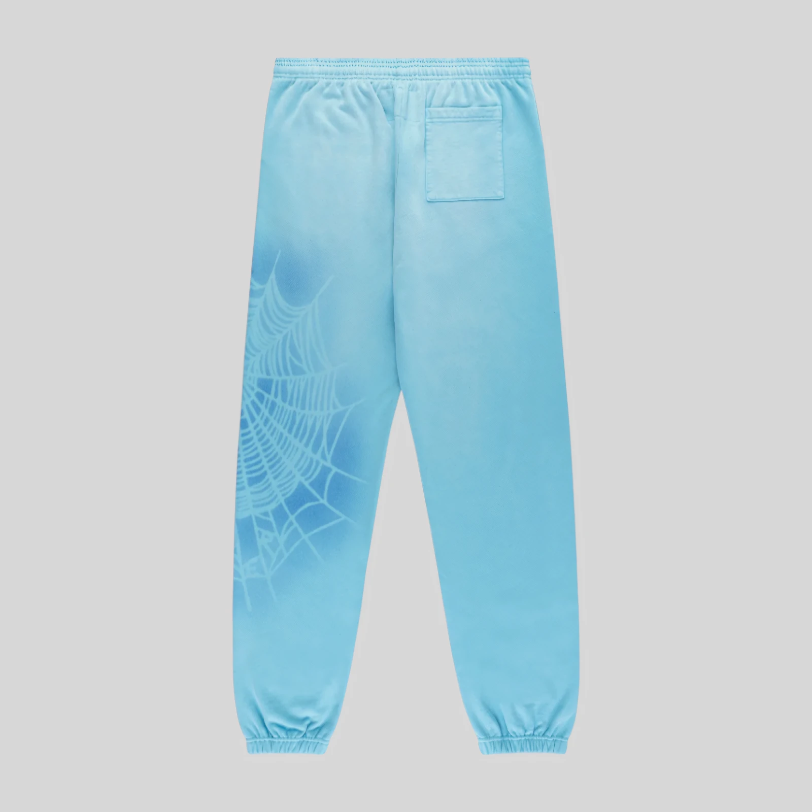 Back view of the Light Blue Sp5der OG Web V2 Spray Sweatpants featuring the iconic signature spider web graphic.