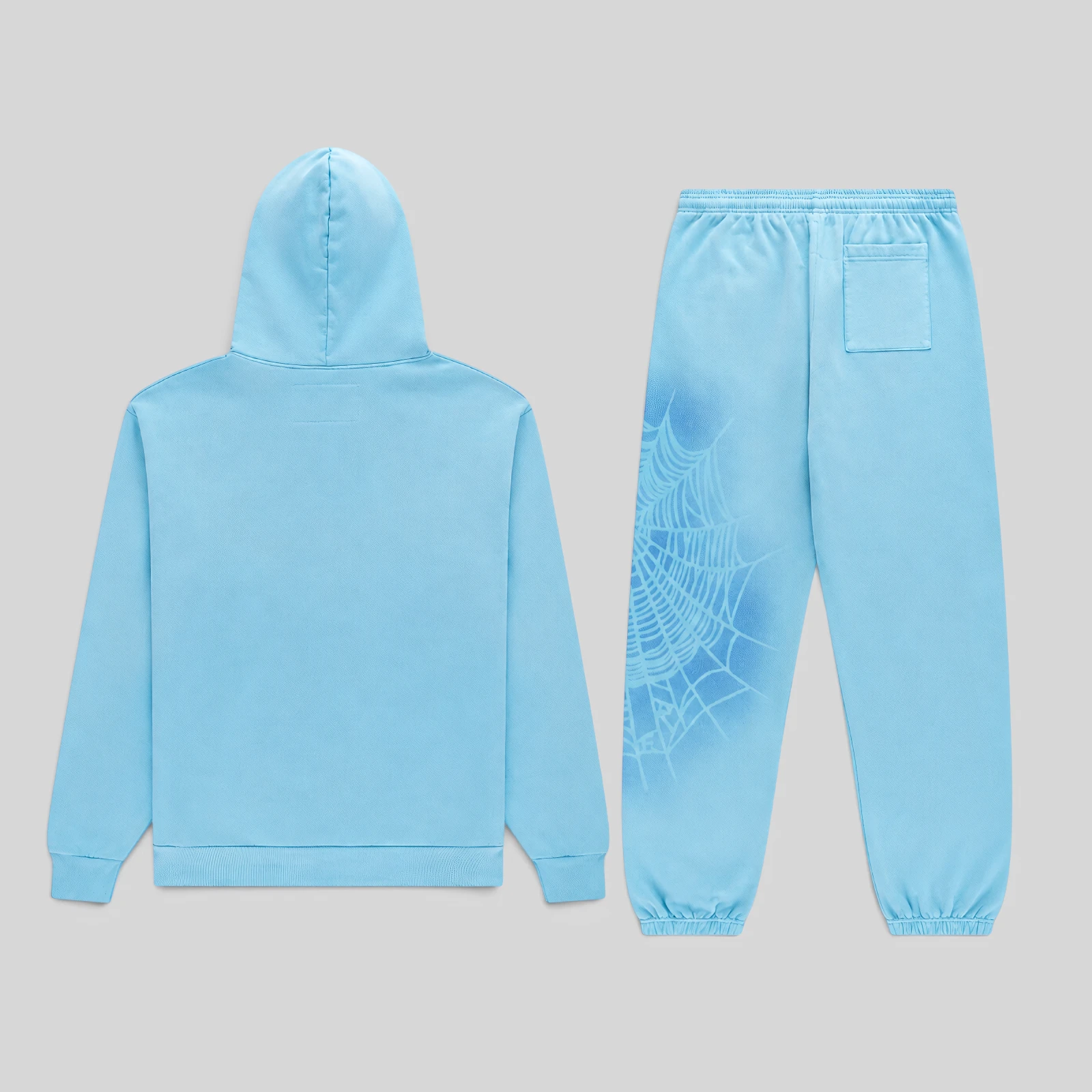 Back view of the Sp5der OG Web V2 Spray Tracksuit in light blue featuring a matching hoodie and web graphic sweatpants.