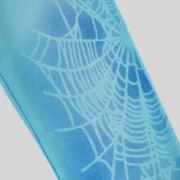 Close-up view of the intricate spray web graphic detail on the Sp5der OG Web V2 Spray Sweatpant in Light Blue cotton fleece.