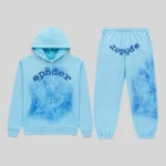 Sp5der OG Web V2 Spray Light Blue tracksuit featuring a cotton fleece hoodie and matching pants with signature graphics.