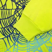 Close-up view of the Acid Green Sp5der OG Web V2 gradient hoodie showing the detailed signature web print and fabric.
