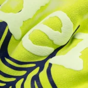 Close-up of the Sp5der OG Web V2 Gradient Hoodie in Acid Green, highlighting the textured puff print web graphic.