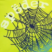 Detailed close-up of the Sp5der OG Web V2 gradient acid green hoodie showcasing the signature web graphic print.