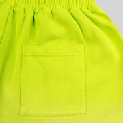 Close-up view of the back patch pocket detail on the Acid Green Sp5der OG Web V2 Gradient brushed fleece sweatshorts.