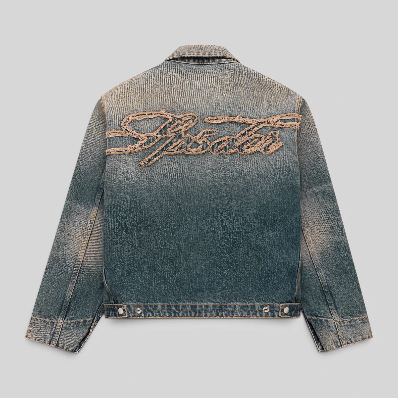 Back view of the Sp5der Script Denim Work Jacket in Light Wash Denim with signature frayed embroidery detailing.