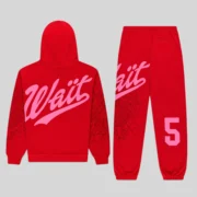 Back view of the Sp5der Stadium Tracksuit in Red featuring signature pink Wait script and web graphic print details.