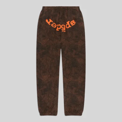 Sp5der T&F Tree Camo Sweatpants in Brown featuring a signature orange graphic print on premium 13oz cotton fleece.