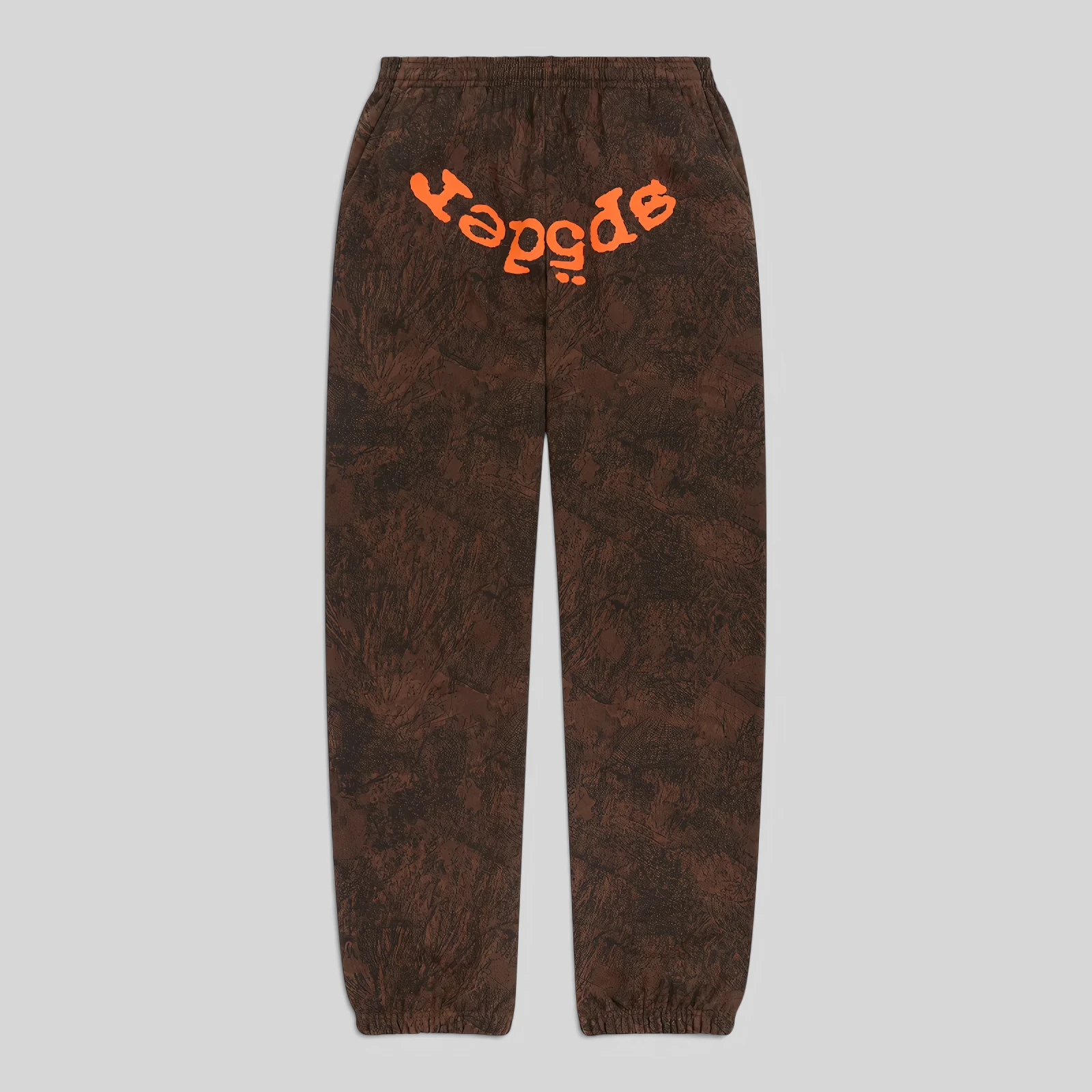 Sp5der T&F Tree Camo Sweatpants in Brown featuring a signature orange graphic print on premium 13oz cotton fleece.