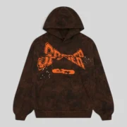 Front view of the Sp5der T&F Tree Camo Hoodie in brown featuring a signature puff print graphic design on the chest.