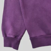 Close-up view of the premium heavyweight cotton fleece fabric on the Sp5der Purple Web Hoodie Archive edition.